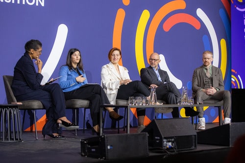 Speakers on stage at energy conference, amsterdam