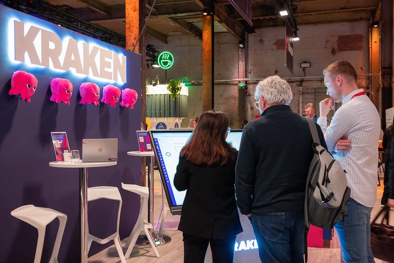 Attendees at stall at Amsterdam energy transition summit