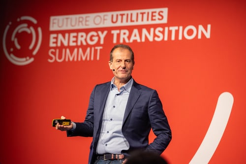 Speaker on stage at energy transition summit