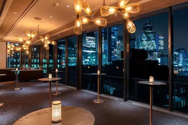 hero-ferus-night-cocktail-table-facing-gerkin-out-window